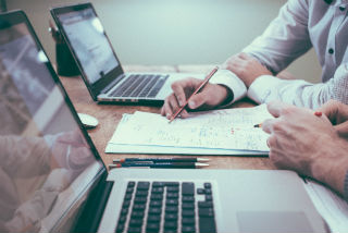 Featured image: Calculating.jpg - Work Ruins Everything! Discover How Franchising Can Prevent Business Burnout
