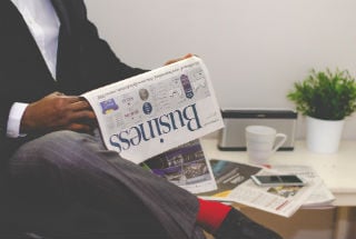 Featured image: Man reading newspaper.jpg - How Do Your Appliance Repair Customers Find You?