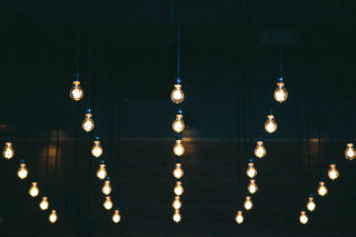 Featured image: light bulbs 2.jpg - Why an Electrician Should Own Their Own Business