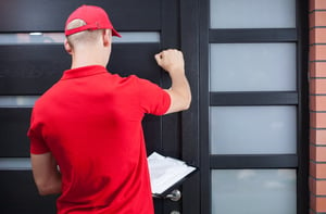 Service tech knocking on door - 5 Tools Everyone in the HVAC Industry Should Be Using