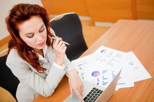 Accountant working at a desk - How to Choose the Right Accountant for You