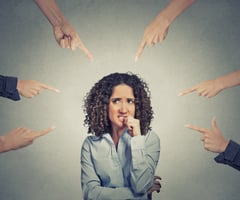 Woman with hands pointing at her. - What To Do If You Hate Your Boss