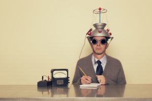 man wearing a mind reading invention on his head