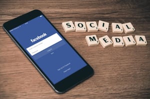 facebook on phone.jpg - Facebook Marketing for New Businesses