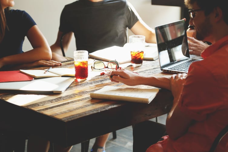 Featured image: people-coffee-tea-meeting.jpg - 3 Tips for Keeping Your Franchise in the Family